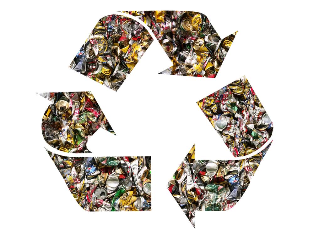 recycling symbol made up of scrap material.
