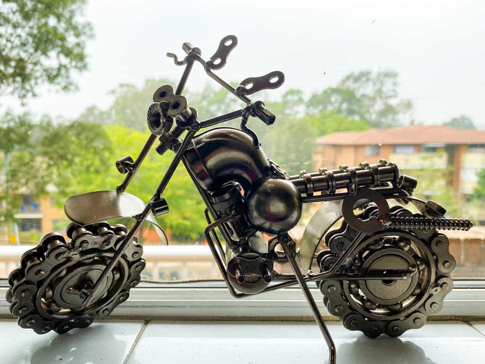 Small motorcycle artwork made of scrap material.